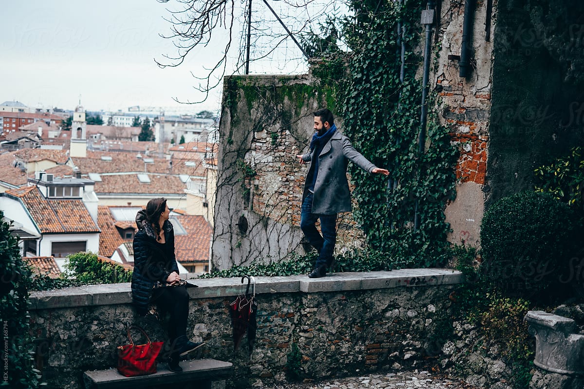 Young Couple Visit Italian City. Balance