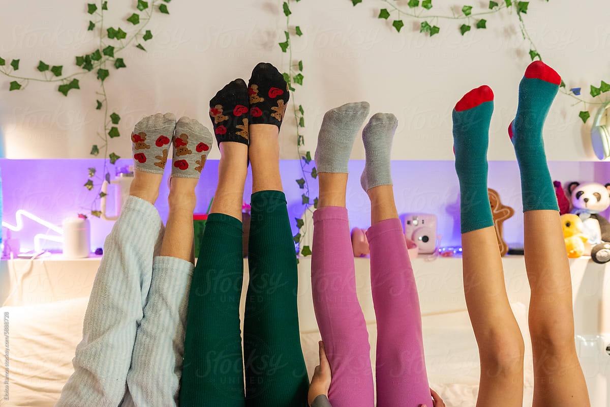 Playful Girls with Feet in the Air