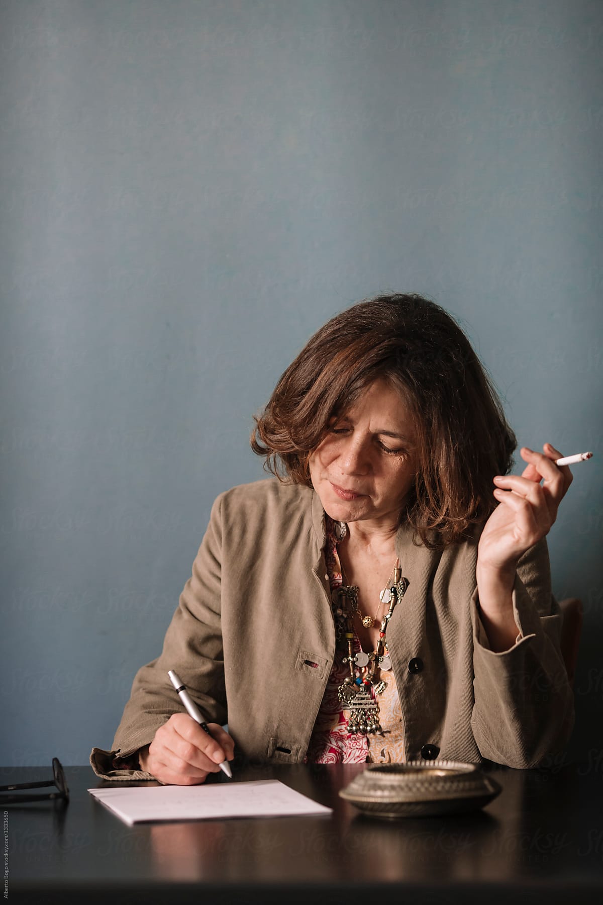 Senior Woman Smoking And Thinking