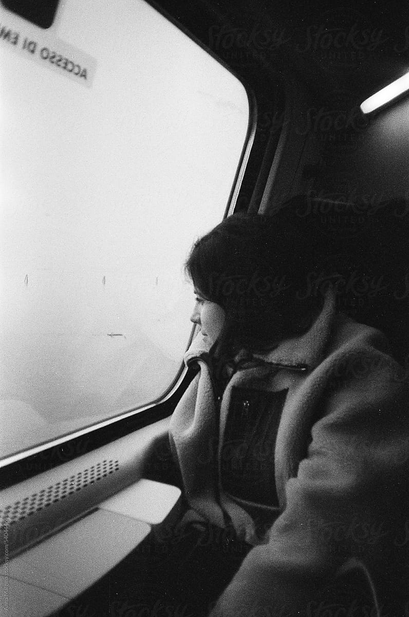 A woman traveling to Venice by train