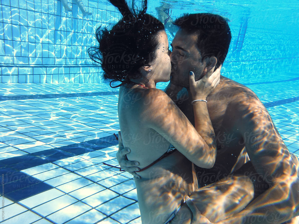 Couple Kissing Under Water