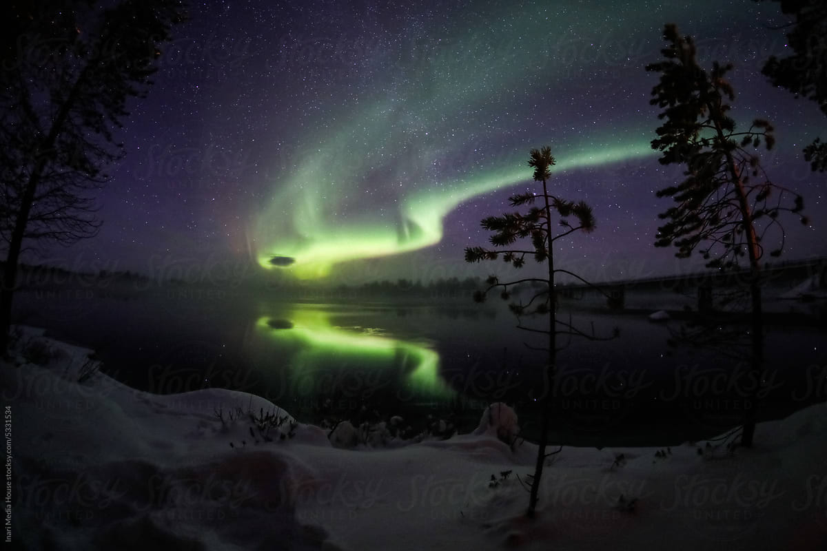 Northern Lights Creates a Display of Light and Color On the Starry Sky