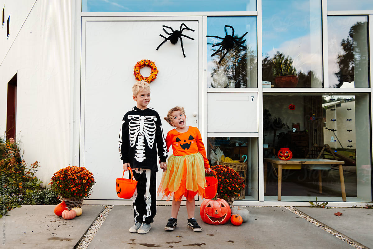 Halloween season: kids with costumes ready for trick or treating