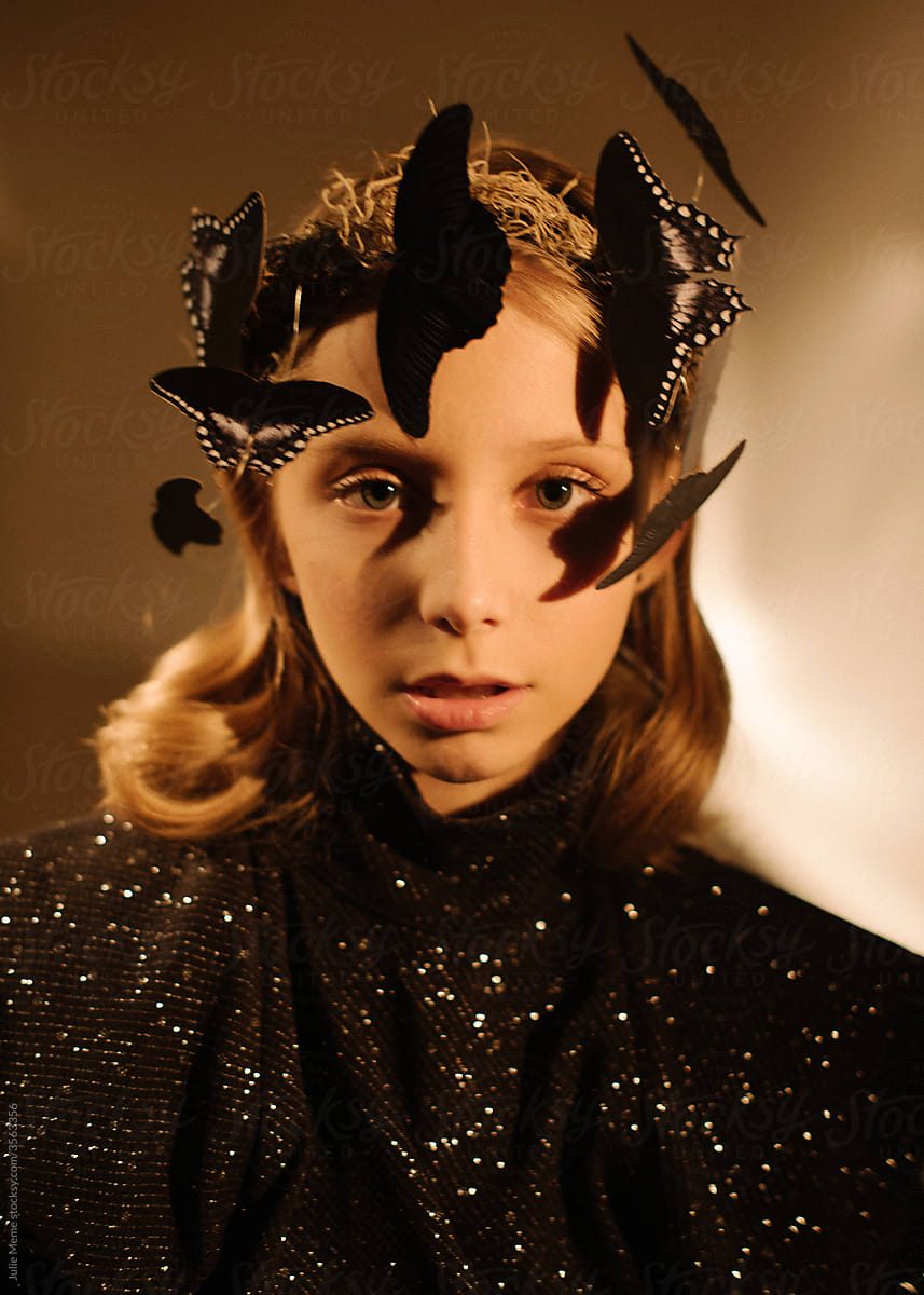 Portrait Of A Blond Girl In The Black Dress With Butterflies Wreath On Her  Head" by Stocksy Contributor "Julie Meme" - Stocksy