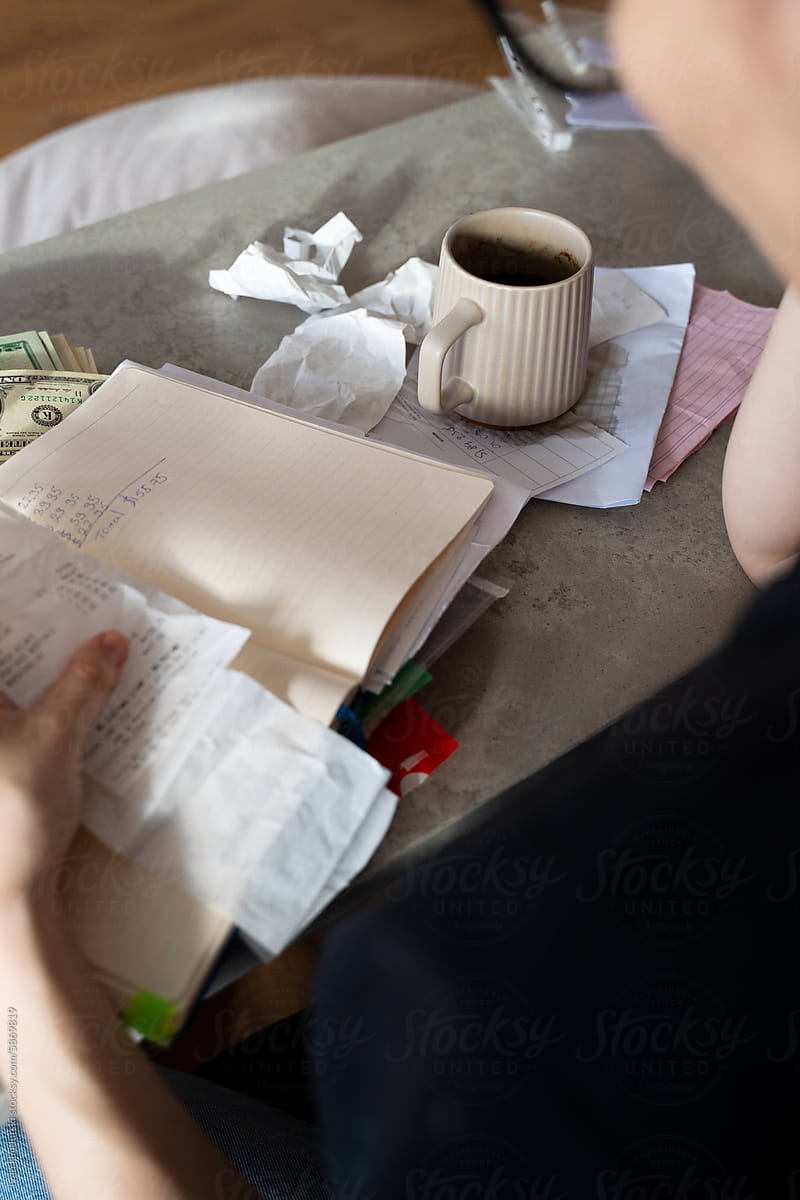 Woman Accounting Financial Papers At Home