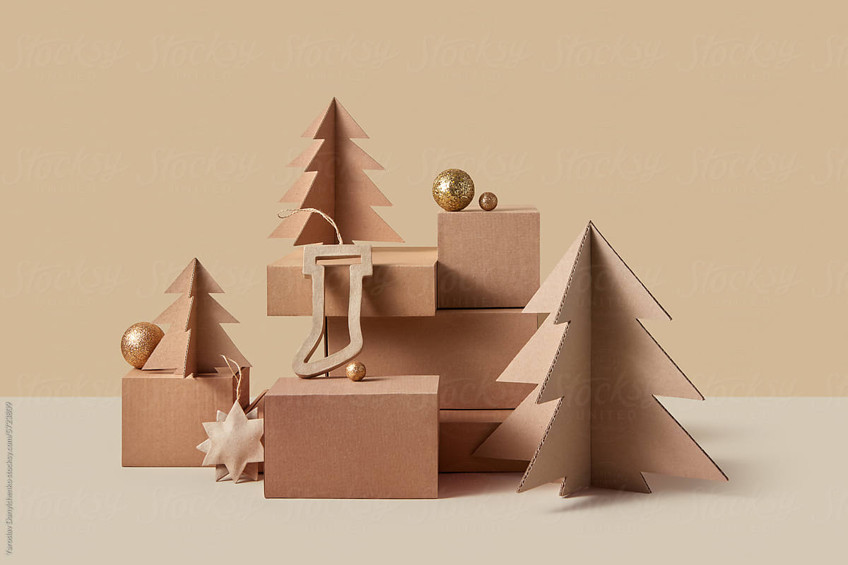 Christmas trees, gift boxes and decor made of recycled cardboard