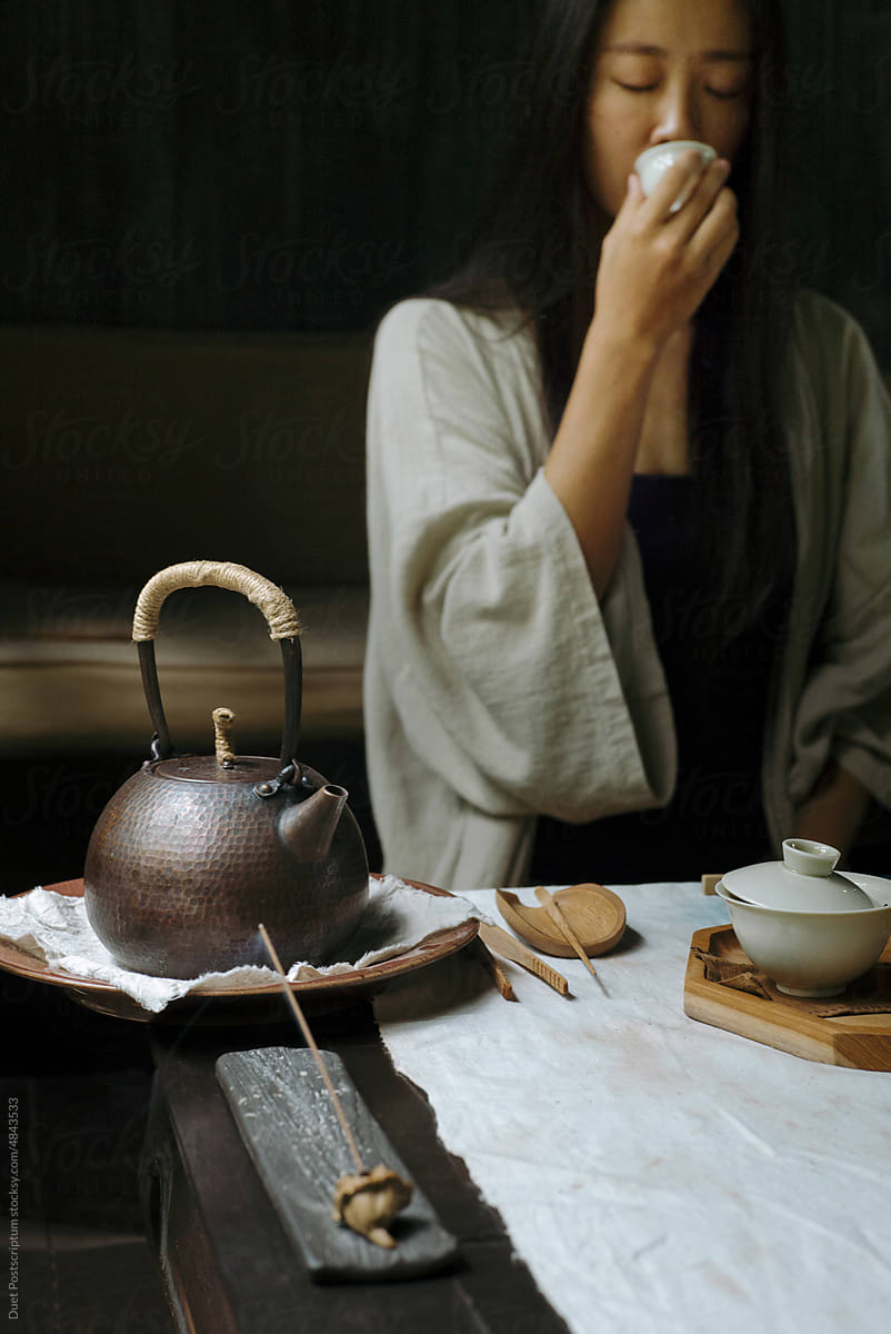 Portrait of a young asian female tea master