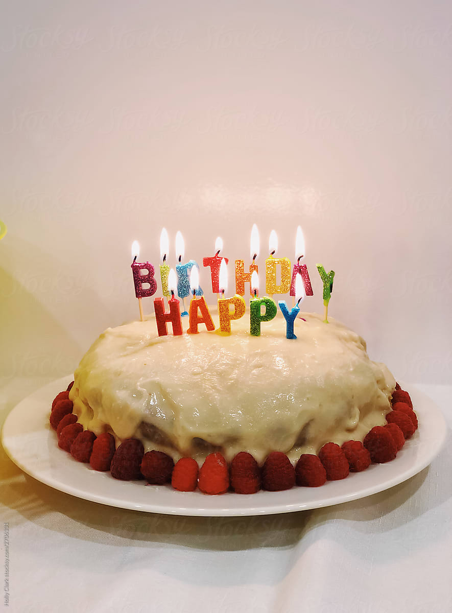Sloppy Homemade Gluten-Free Birthday Cake with Burning Candles