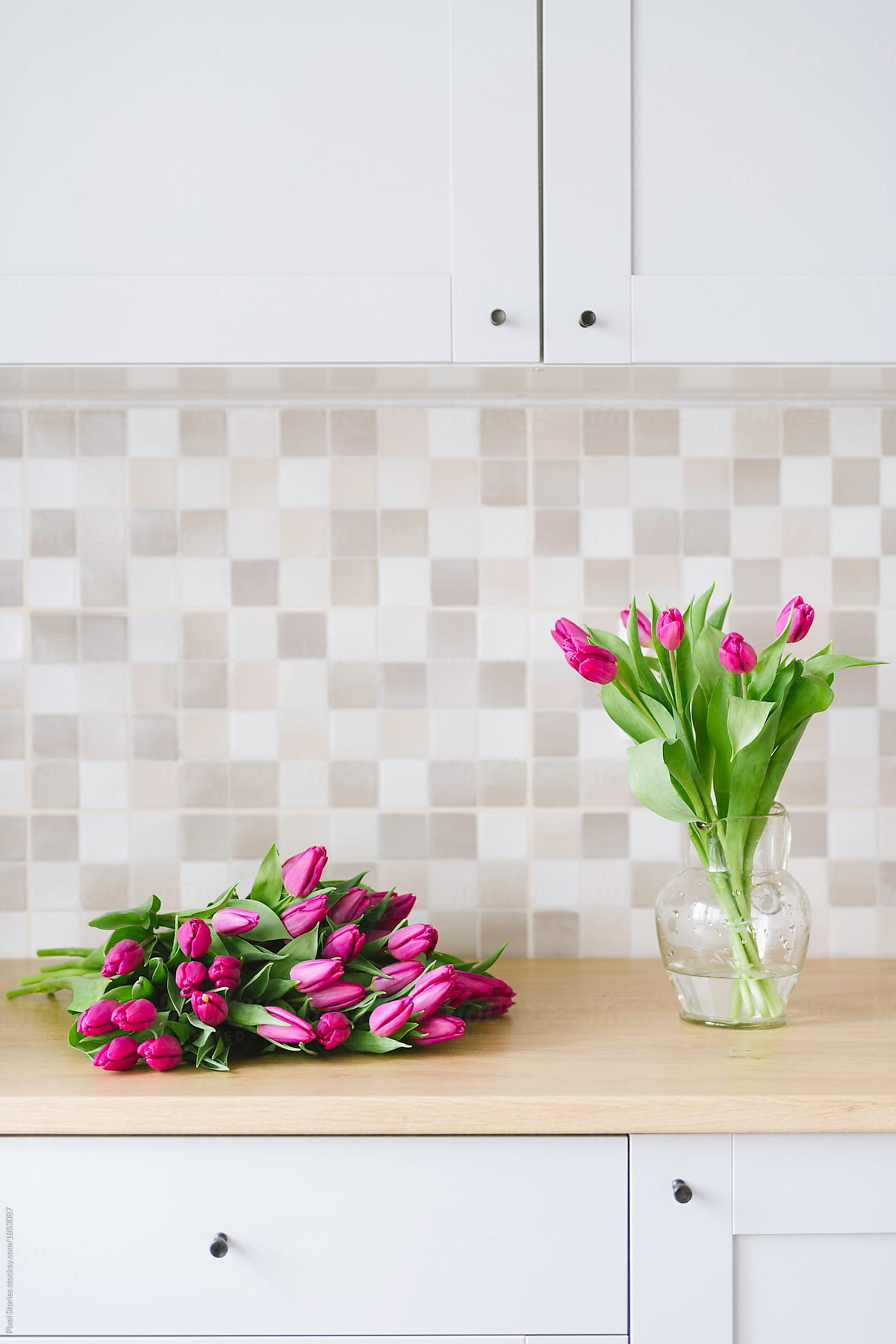 Lilac tulips in a clean contemporary kitchen