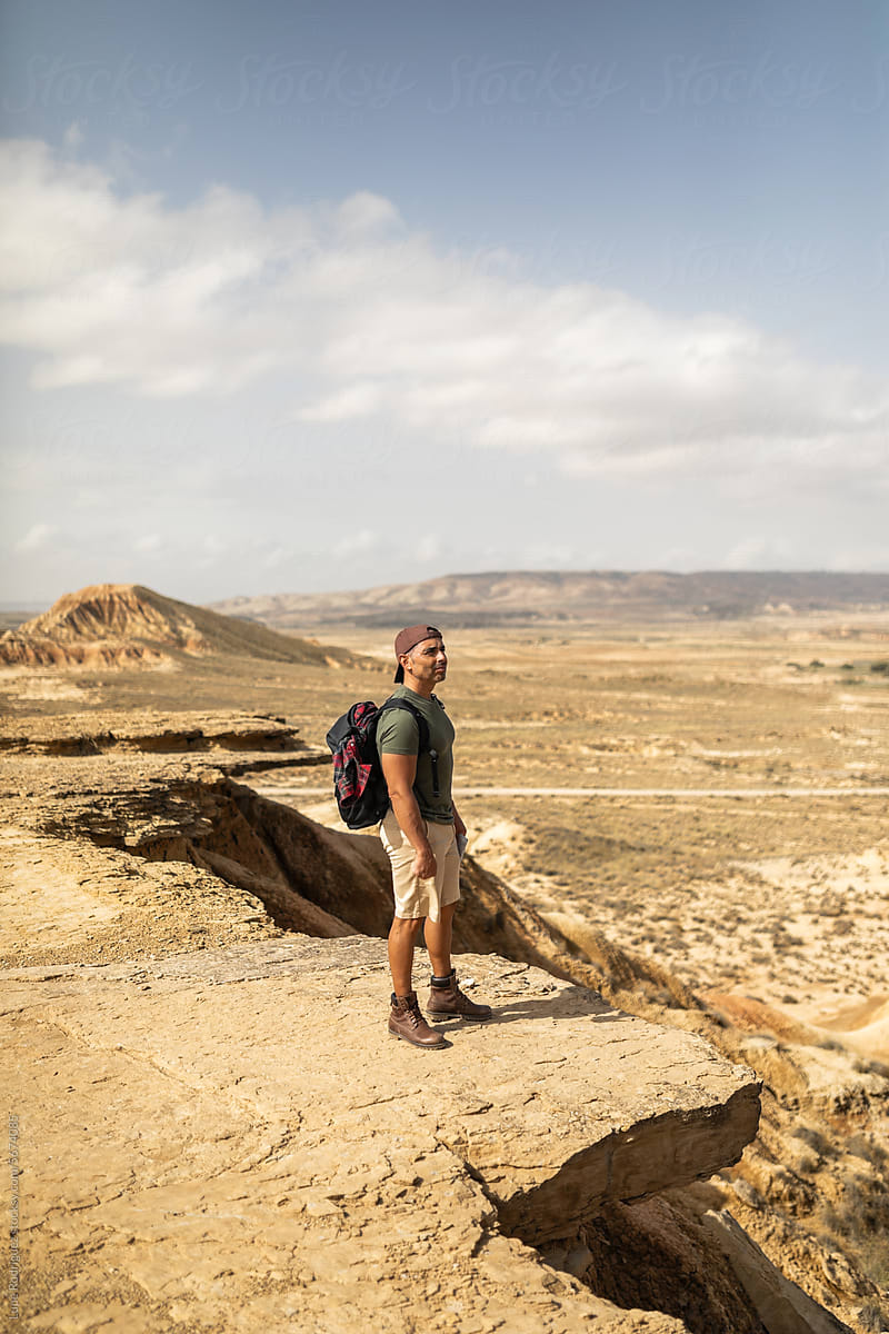 young man in the desert of bardenas reales