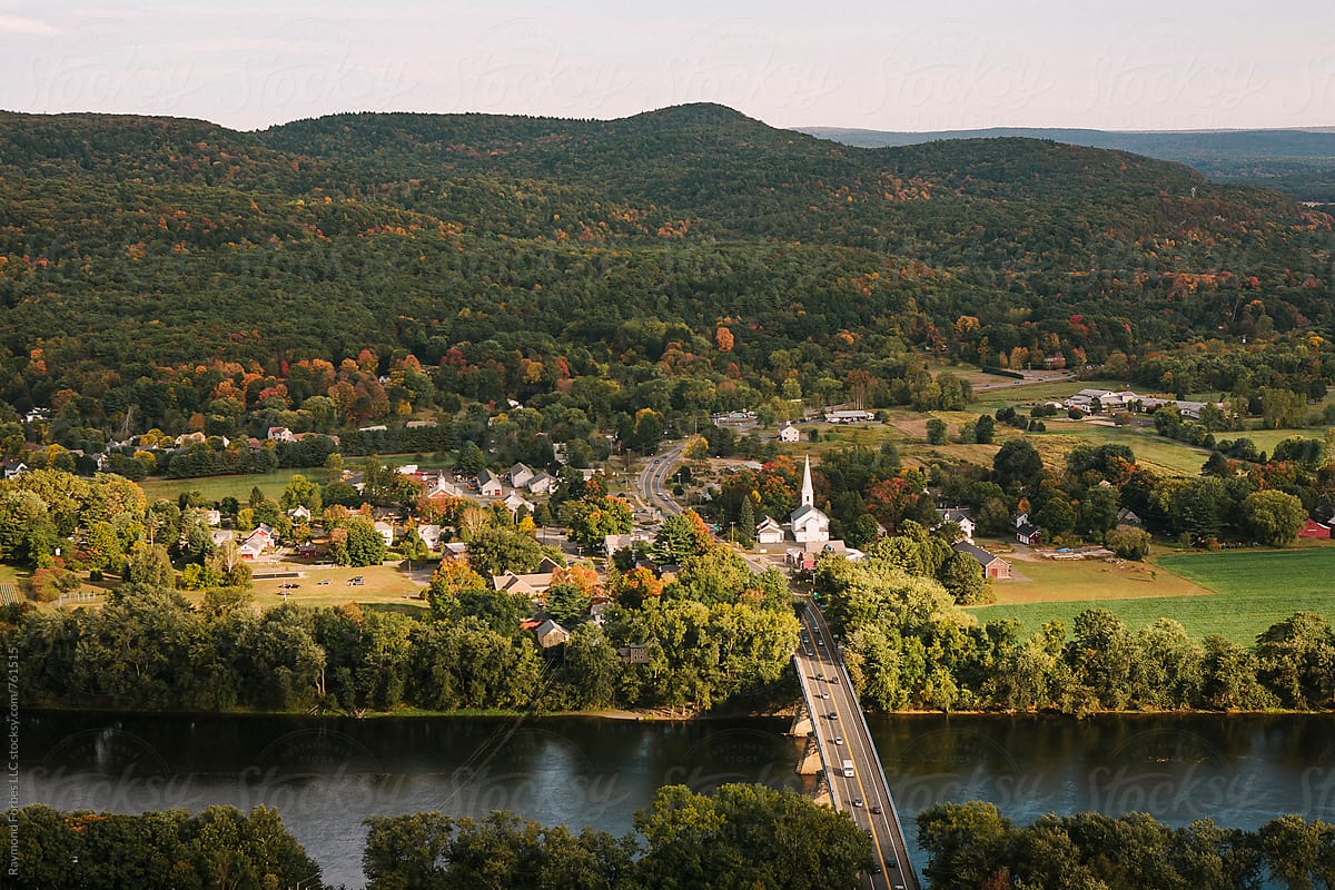 Aerial View Small New England Town with church steeple in Autumn