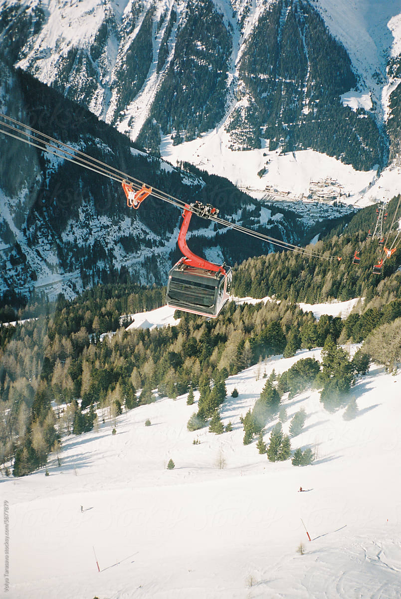 Cable car in snowy mountains