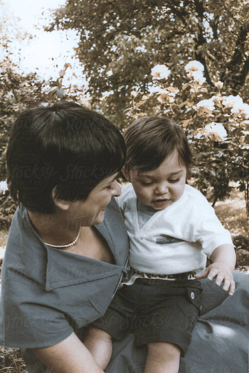 1979. Mom and son in a spring day.