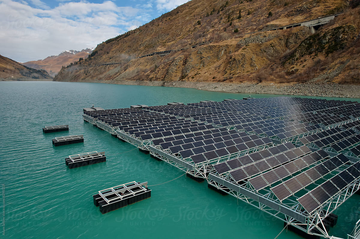 Renewables - floating solar energy power on hydropower dam, aerial
