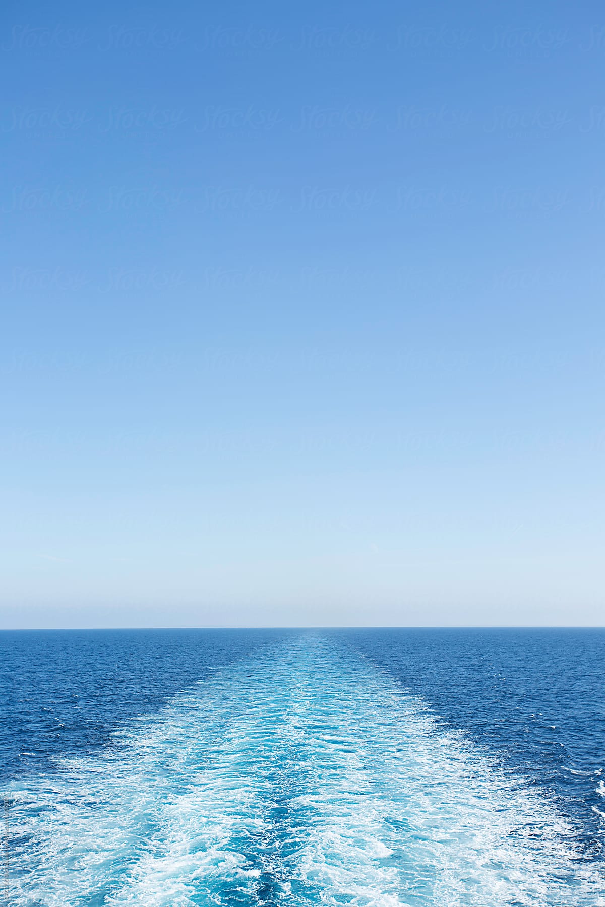 Water wake of a ferry boat in the sea