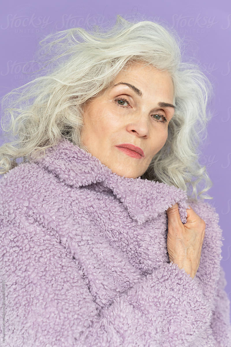 Close Up Studio Portrait Of Woman With Silver Hair