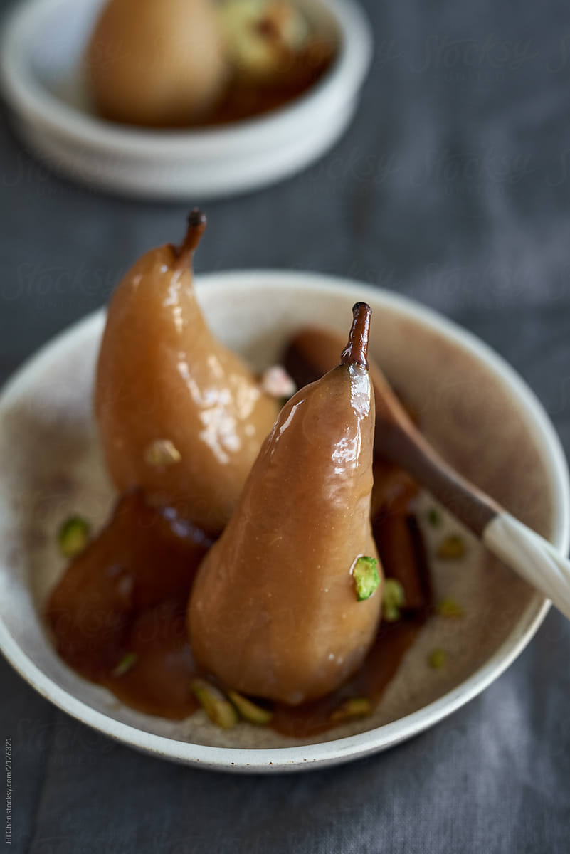Poached pears drizzled with caramel sauce