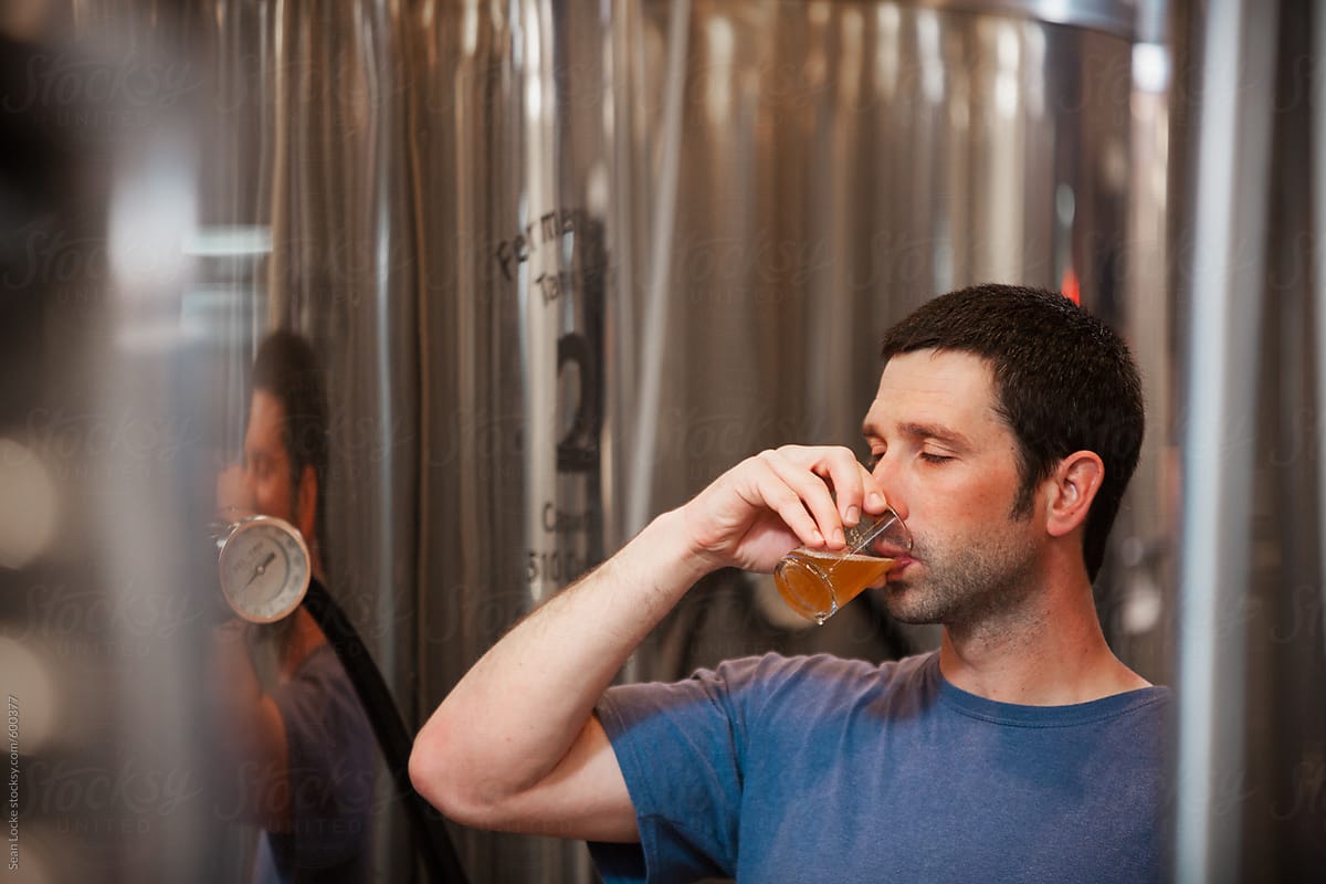 Beer: Brewmaster Tests Ale Sample For Taste