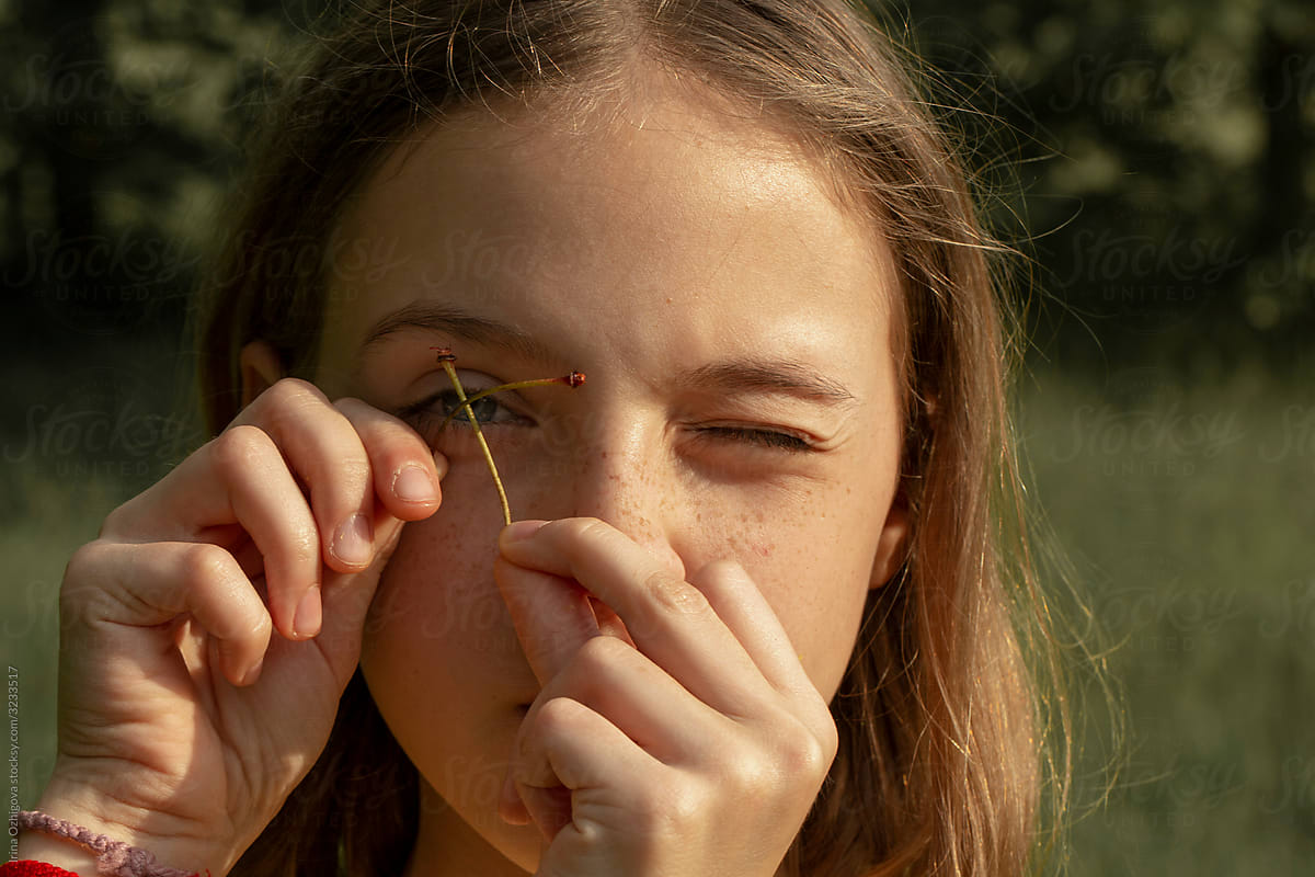 Girl With One Eyes Closed By Stocksy Contributor Irina Ozhigova