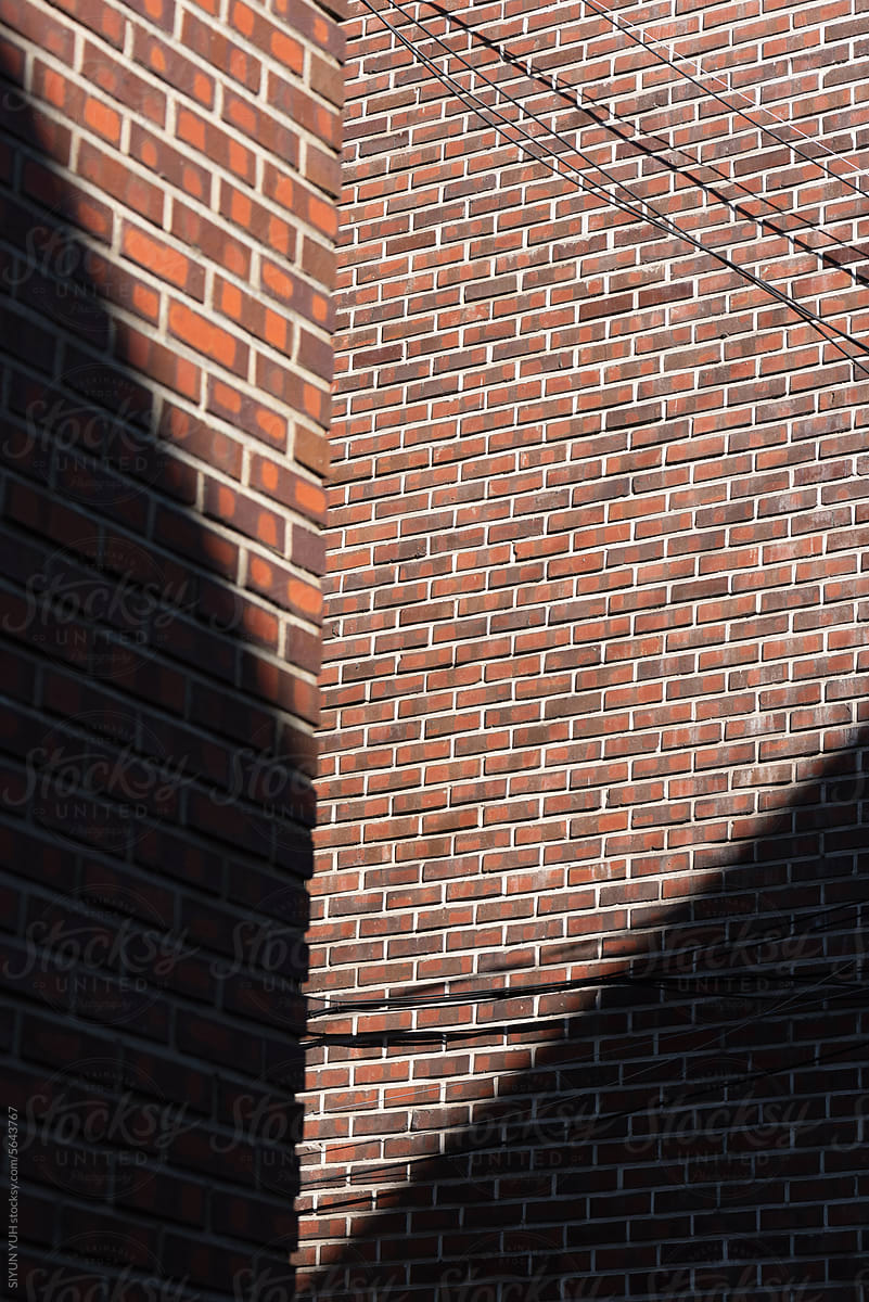 Curious light on the brick building