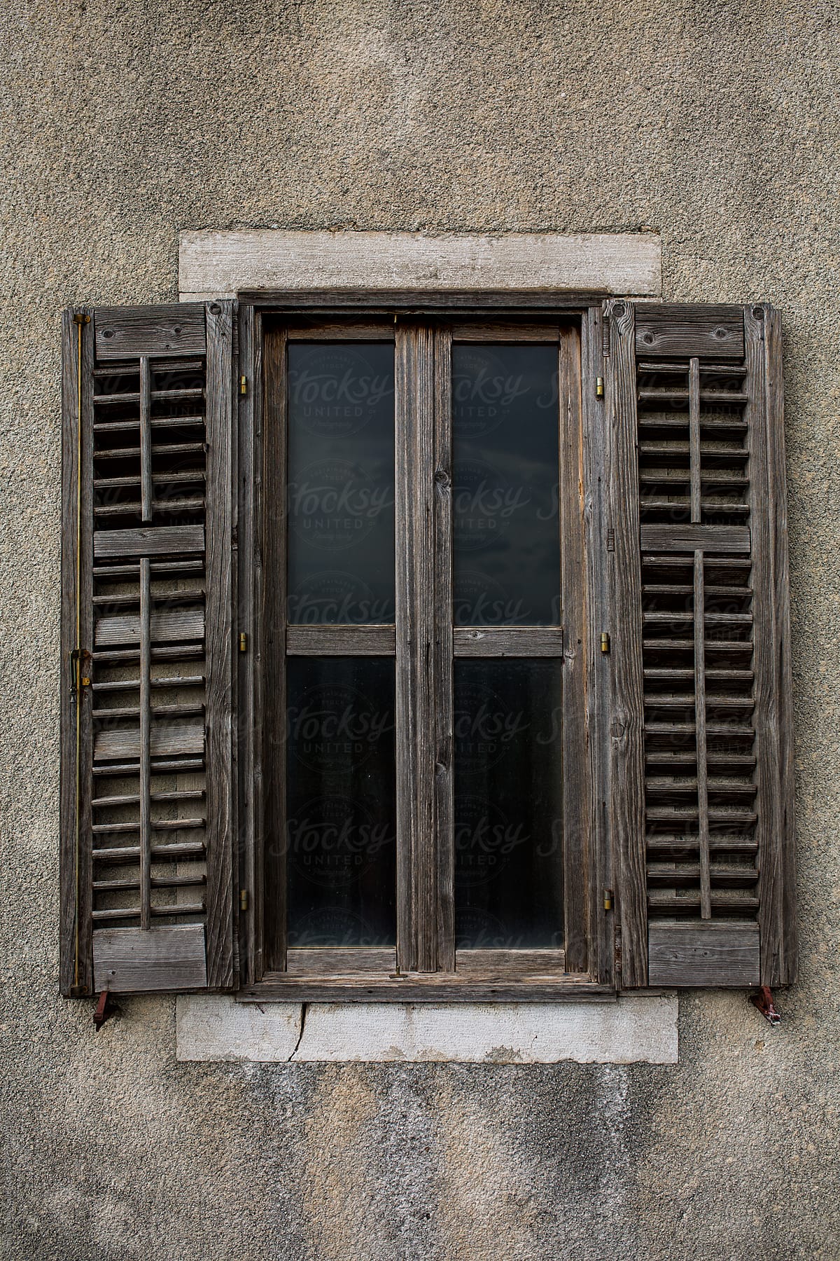Old rustical gray open wooden window