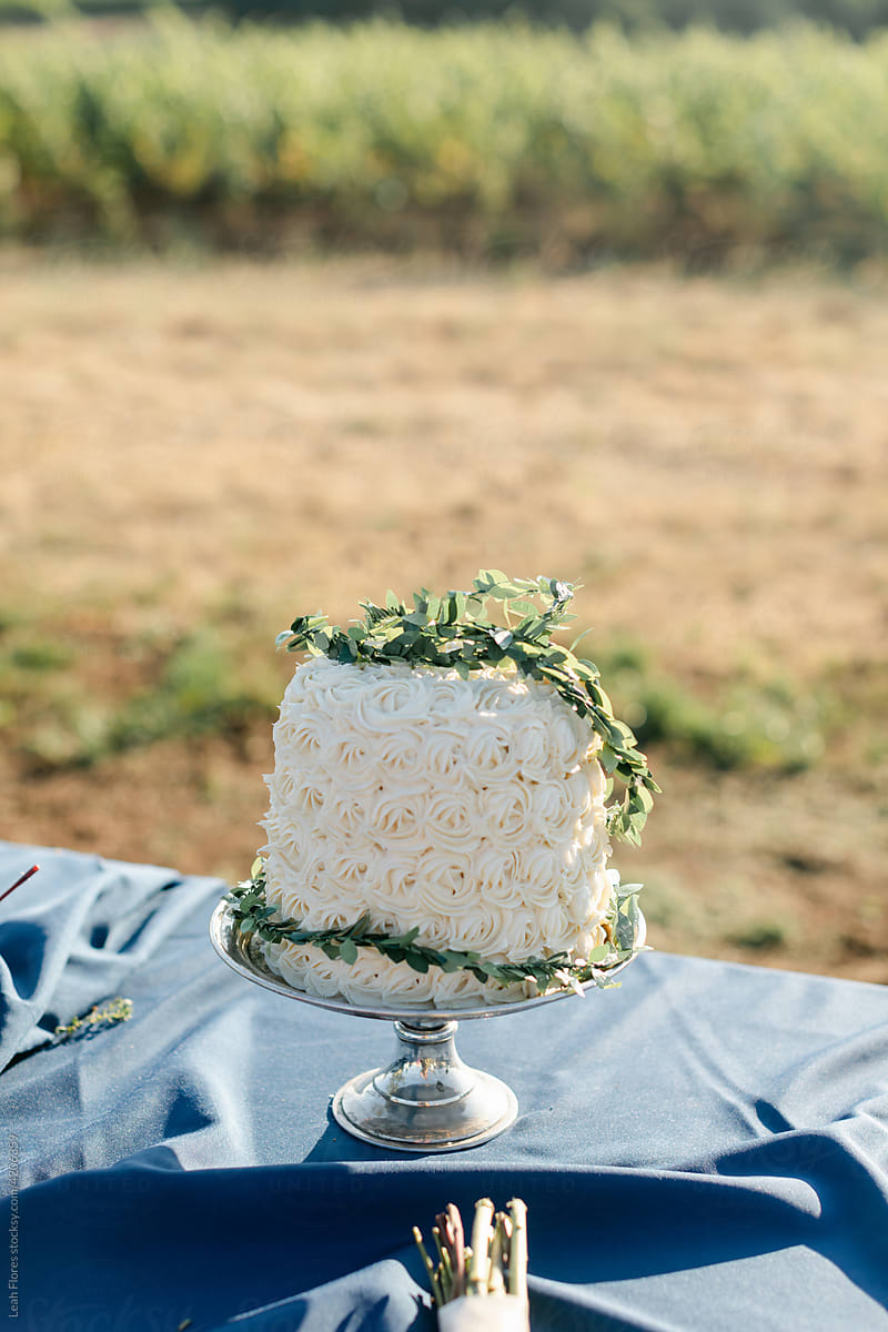White Wedding Cake with Simple Greenery