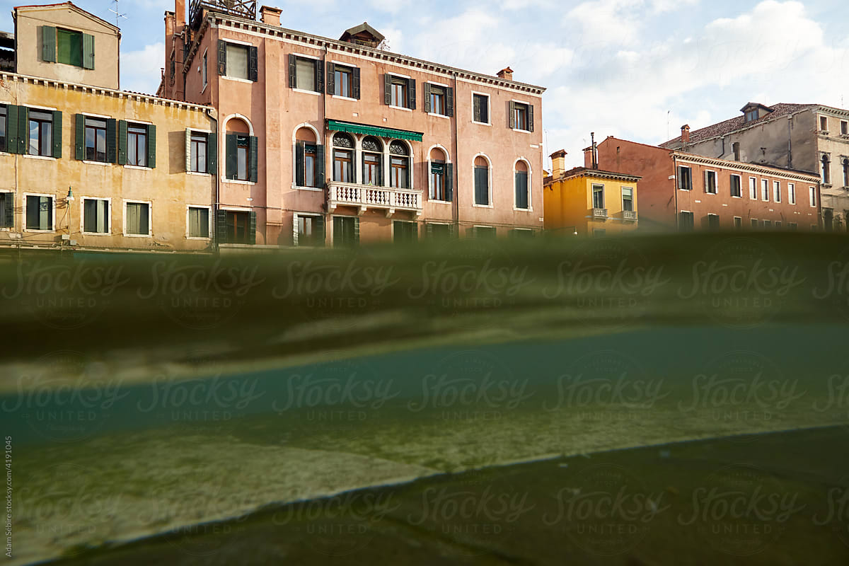 Water meniscus low angle, Venice houses flood