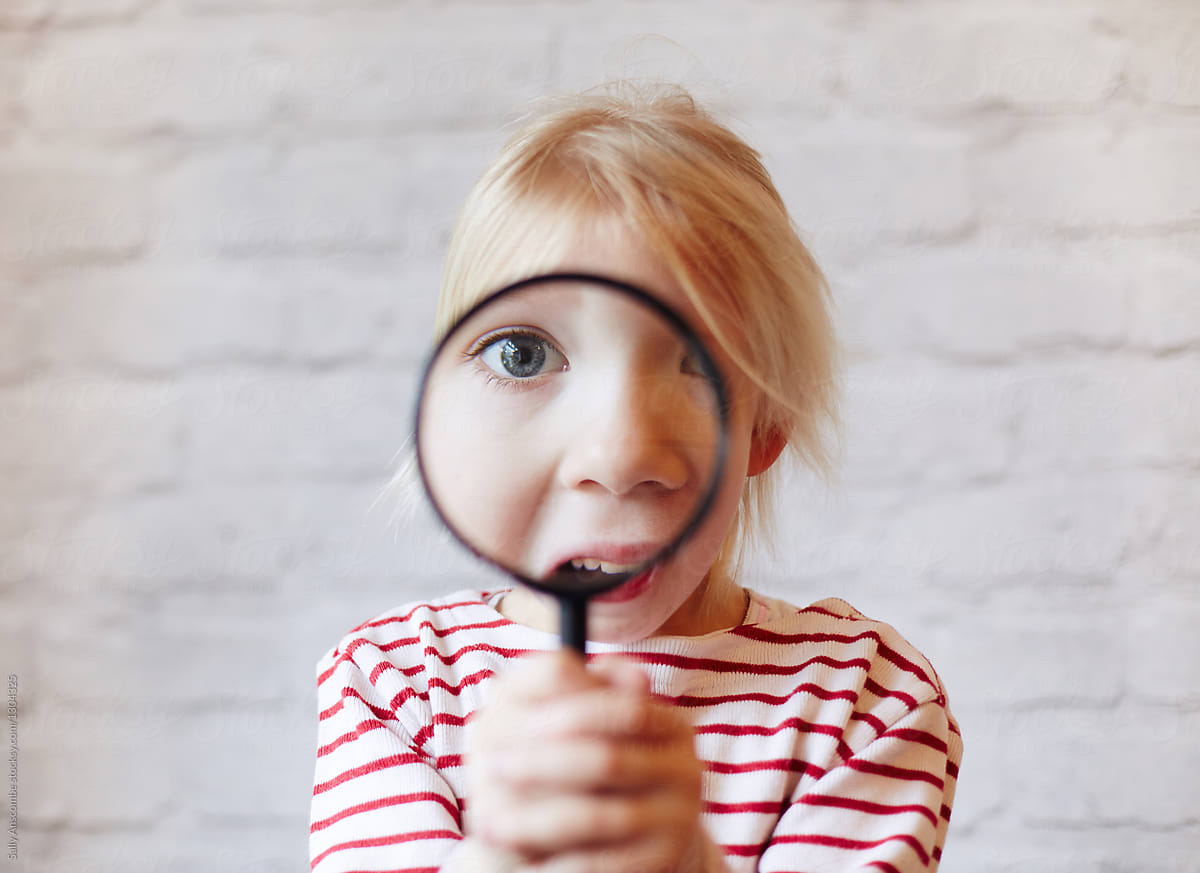 Kid Looking Through Magnifying Glass