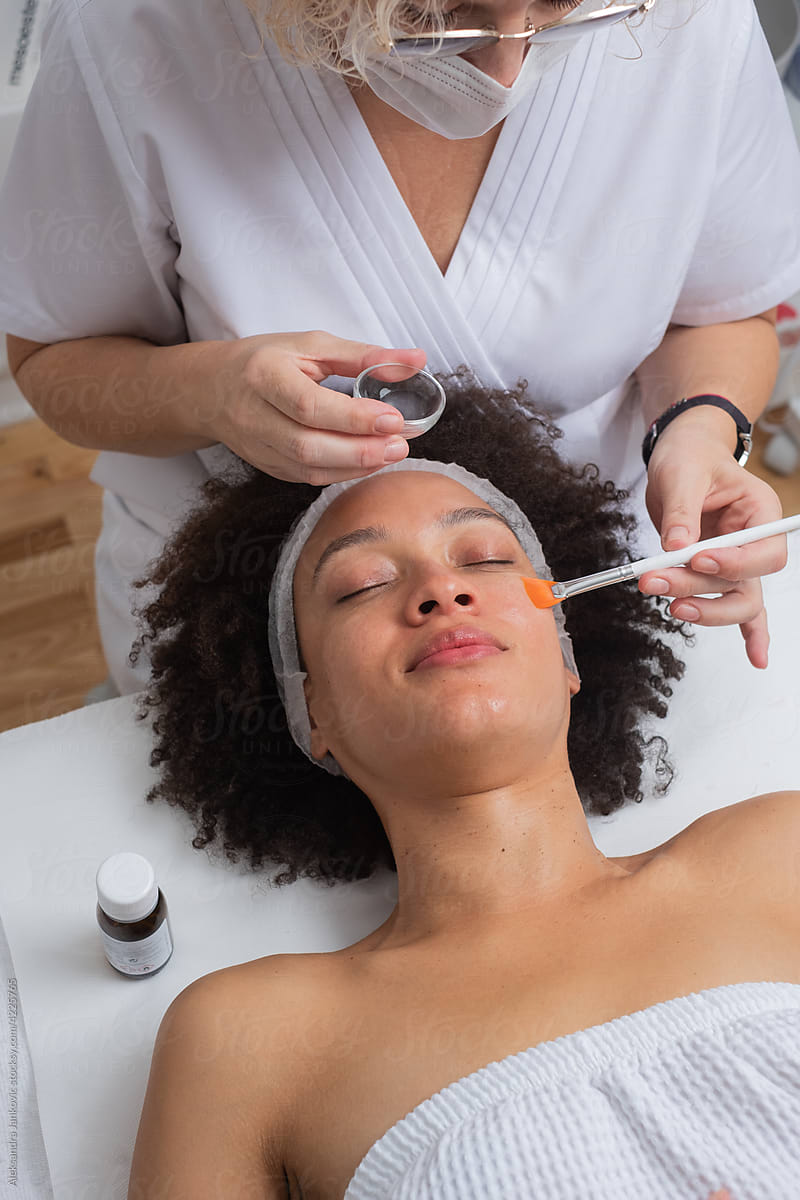 Skin Care Therapist Doing A Chemical Peel  Treatment