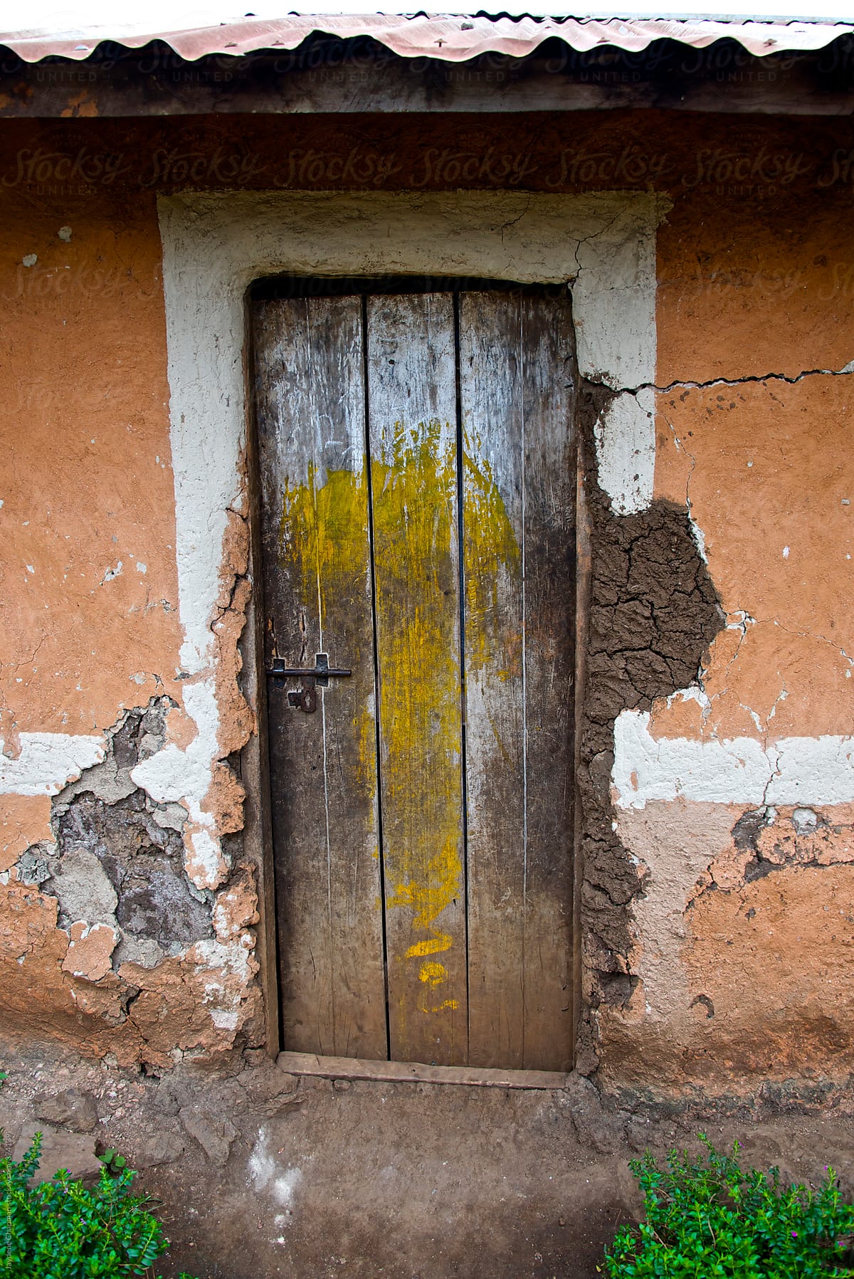 Old cracked poor house  in small village community, Uganda, Africa