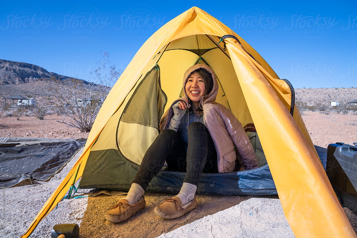 Happy camper in tent