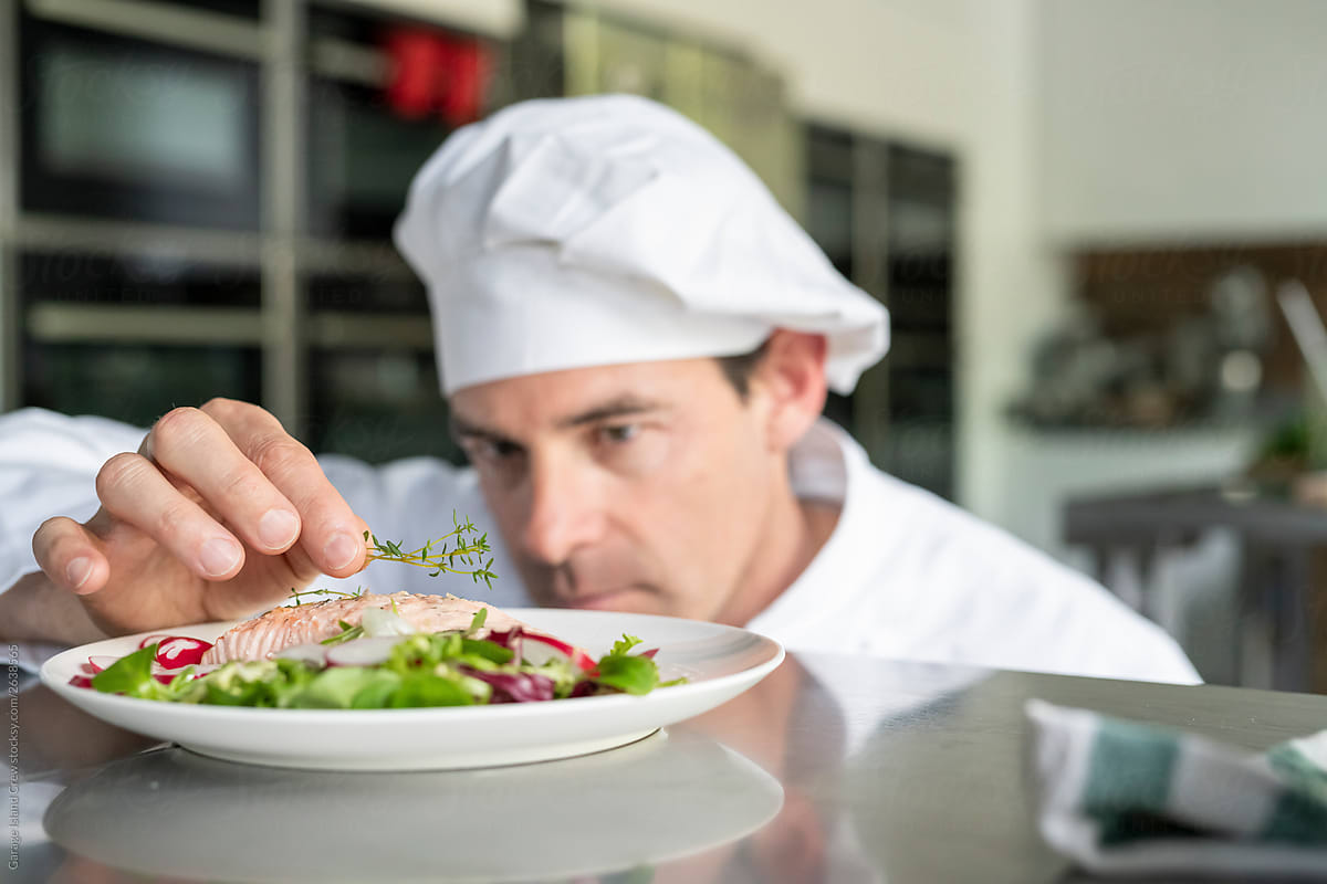 Chef adjusts recipe during a kitchen class