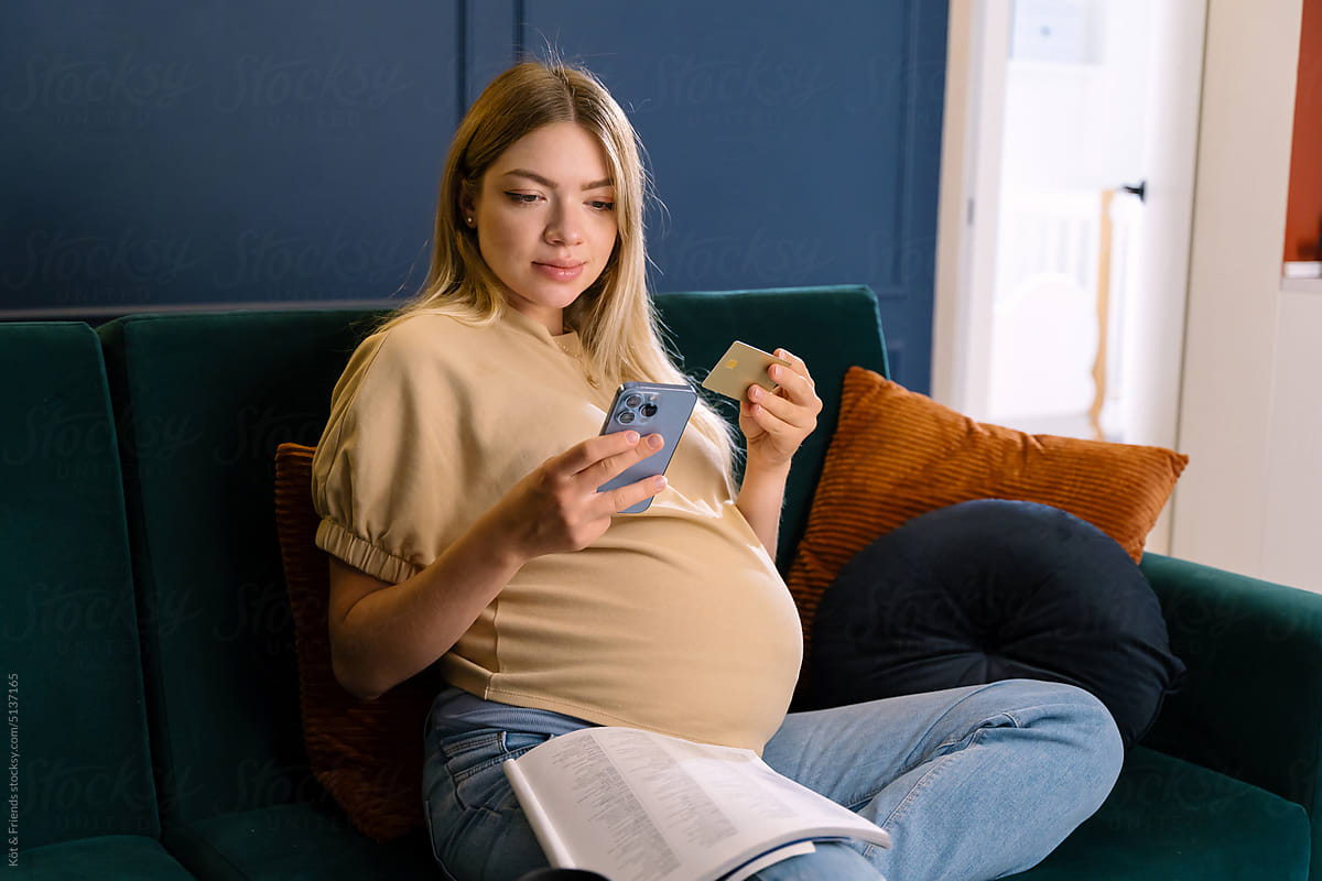 Pregnant Woman Shopping Online On Mobile Phone