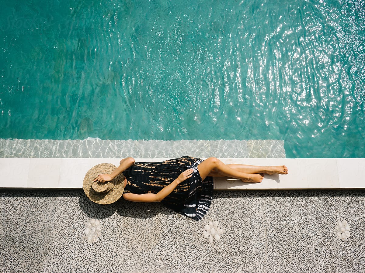Female lying near pool