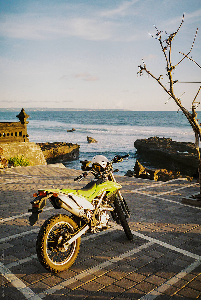 Motorcycle parked near the ocean on Bali