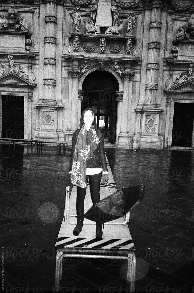 A Beautiful Woman in Venice During a Flood