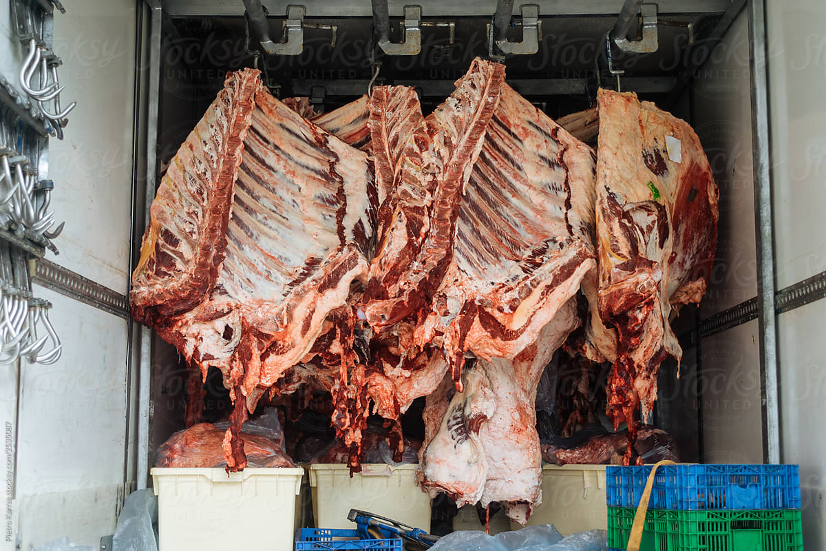 Refrigerated meat on hooks