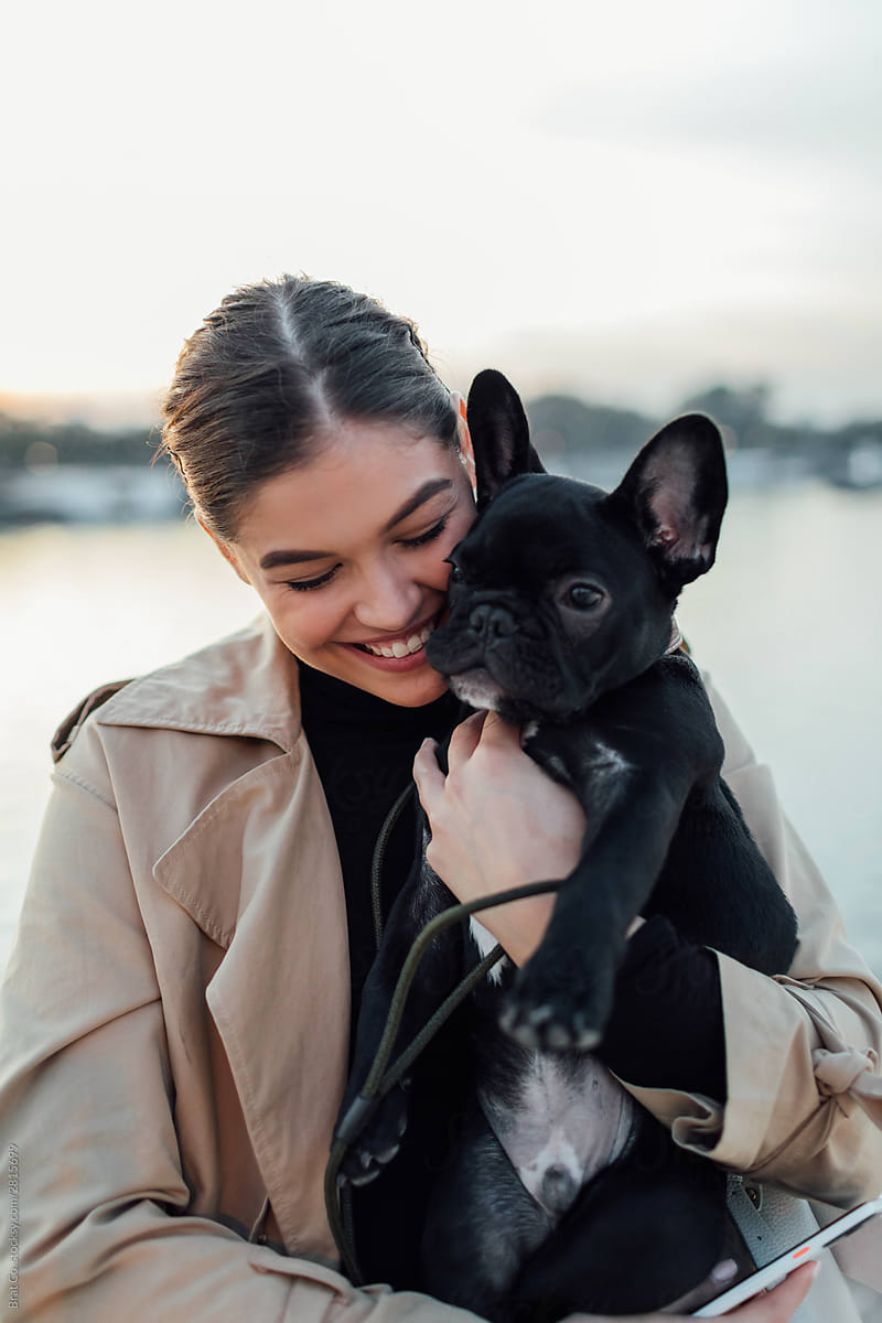 Black Frenchie With His Owner