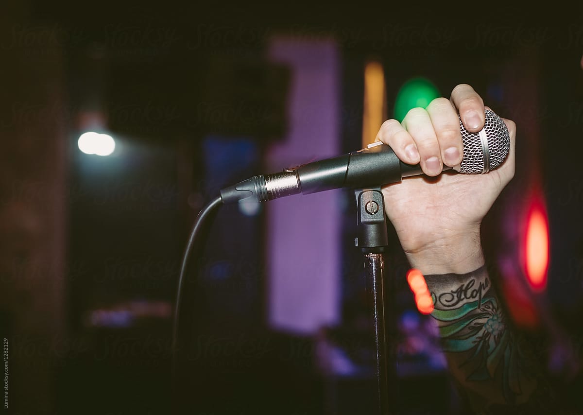 Rock Singer Holding Microphone