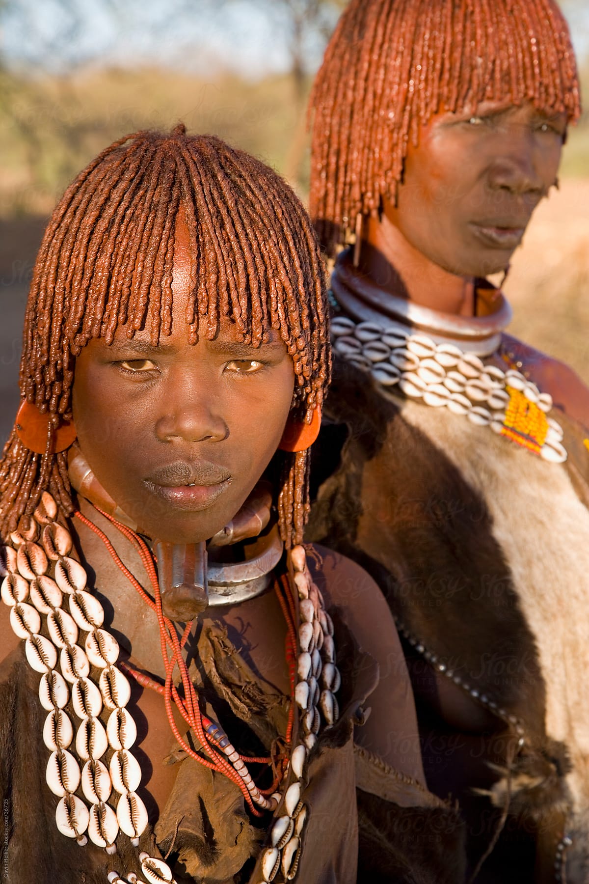 Portrait of two Hamer women with goscha (ochre and resin hair tresses), Hamer Tribe, Lower Omo Valley, southern area, Ethiopia, Africa