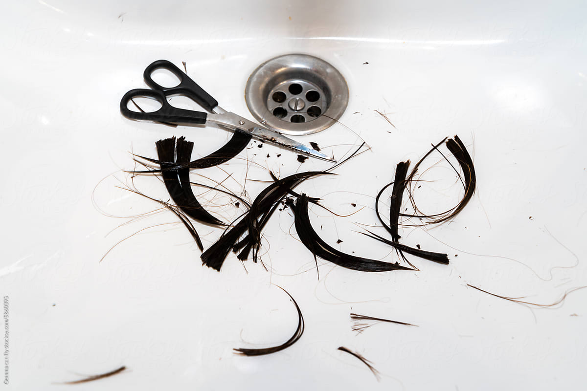 Hair cut in sink with scissors. UGC