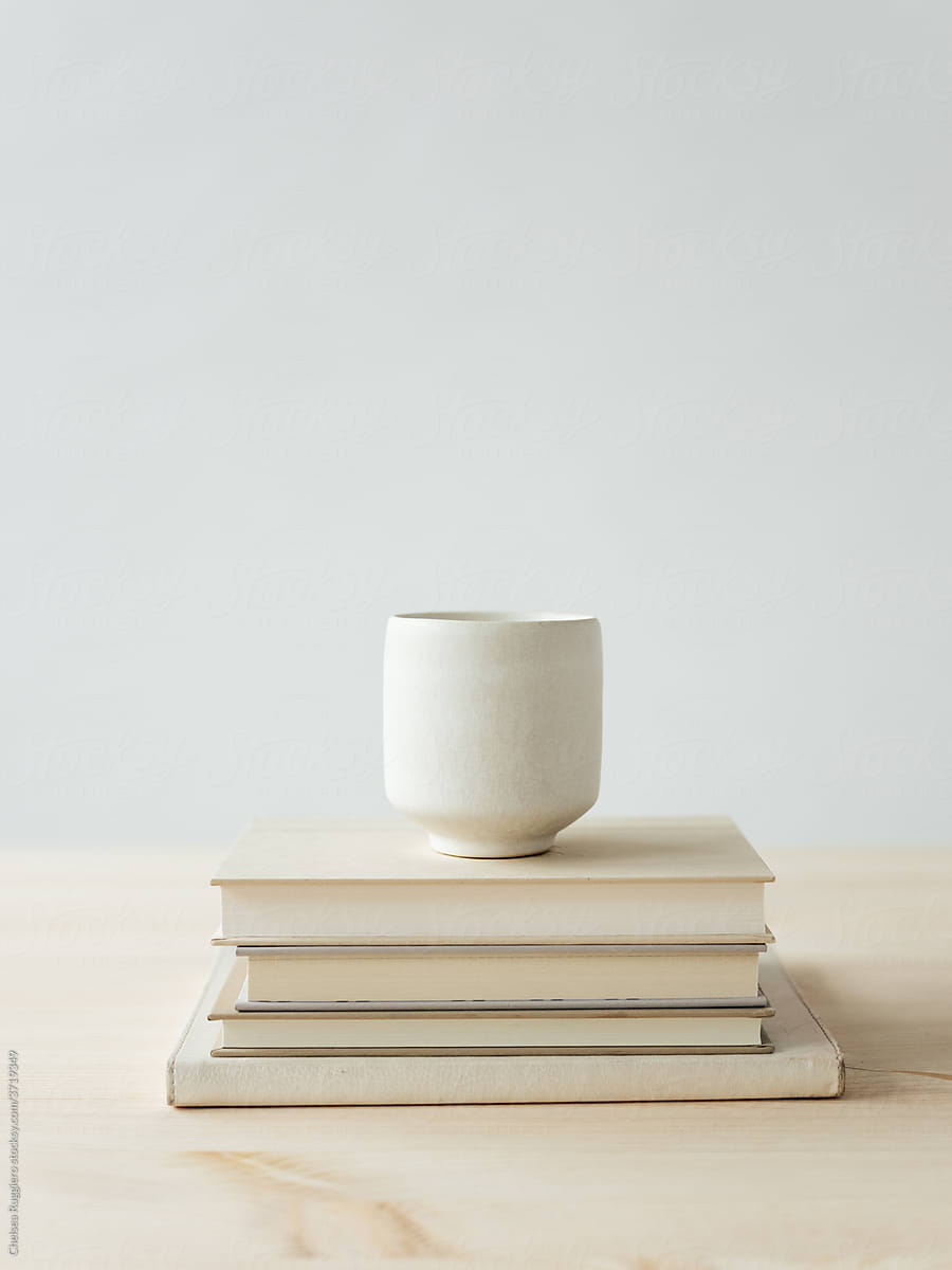 Minimal Table Scene with Stack of Books