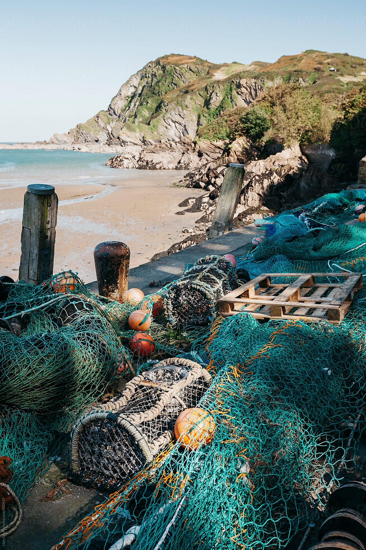 Fishing nets and lobster pots in the harbour at Ilfracombe. Devon, UK.