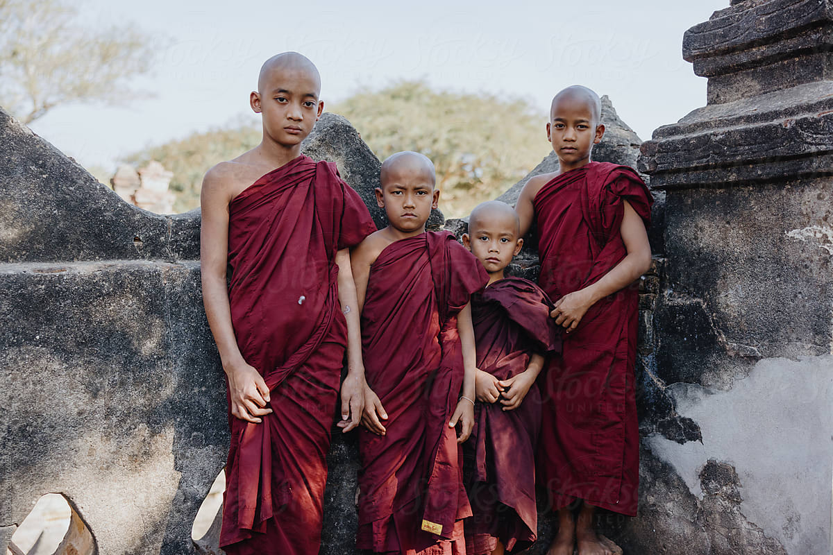 Young monks standing together