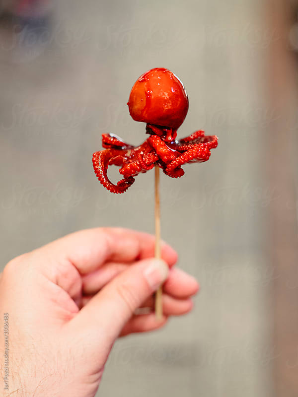 baby octopus stick, red marinated baby octopus in stick selling in fresh market, Japan