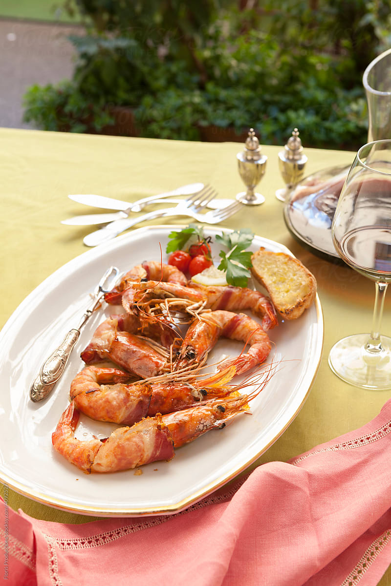 Grilled shrimps on a classic plate.