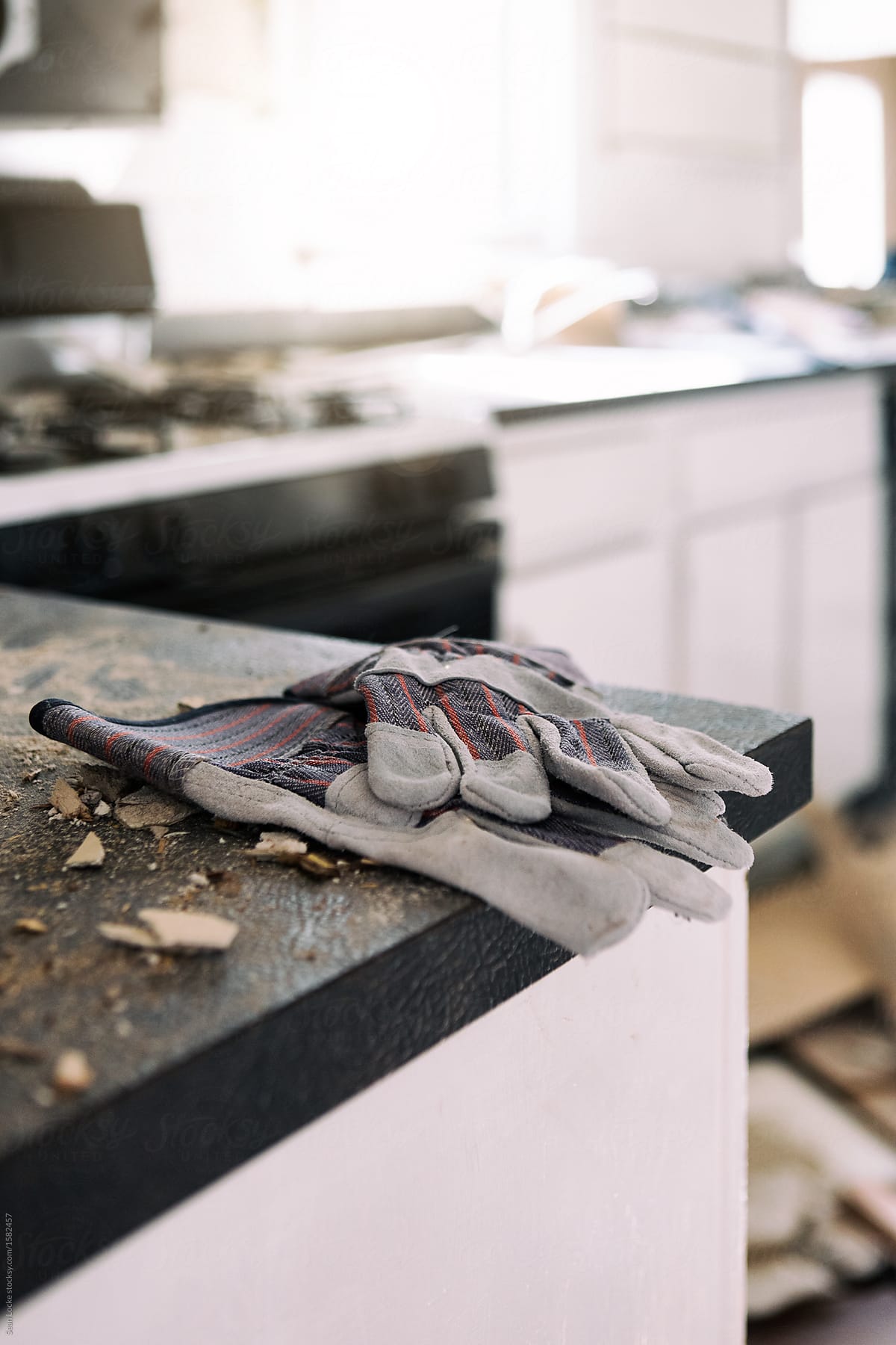 Kitchen: Work Gloves Sit On Messy Countertop