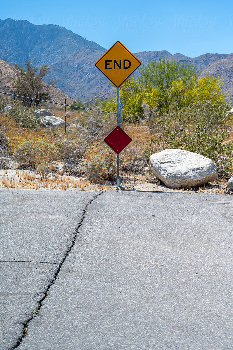 Dead End Sign at the end of a crack road