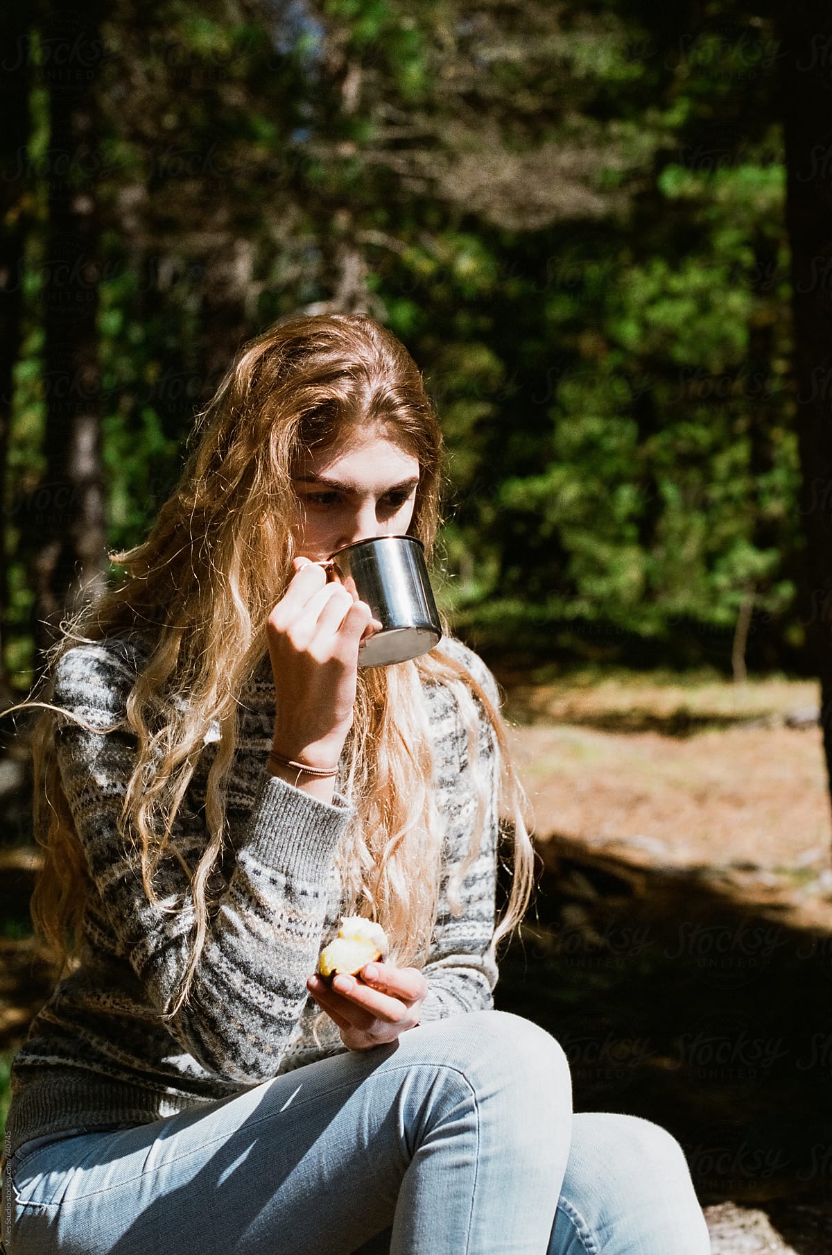 Young woman drinking tea