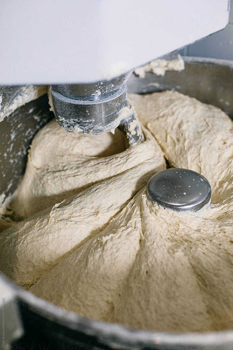 Professional kneading machine with dough